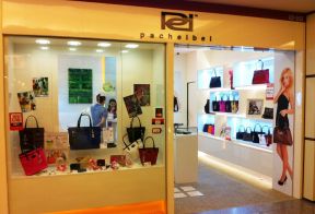 卖包门面装修效果图 店面门头设计