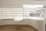 杭州340平米轻奢眼镜店展台装修设计效果图