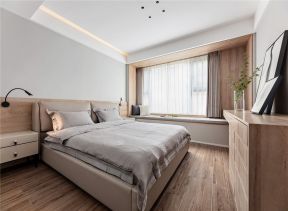卧室飘窗的装修设计 卧室飘窗的装修效果图 卧室木地板装修效果图